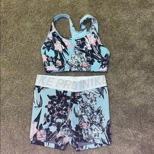 Nike sports bra and compression shorts.